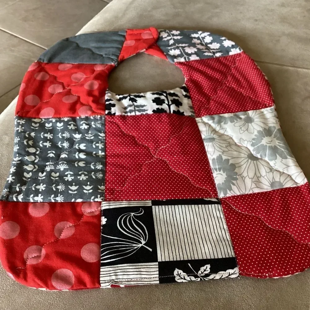 NWT , quilted reversible, handcrafted, baby bib reds
